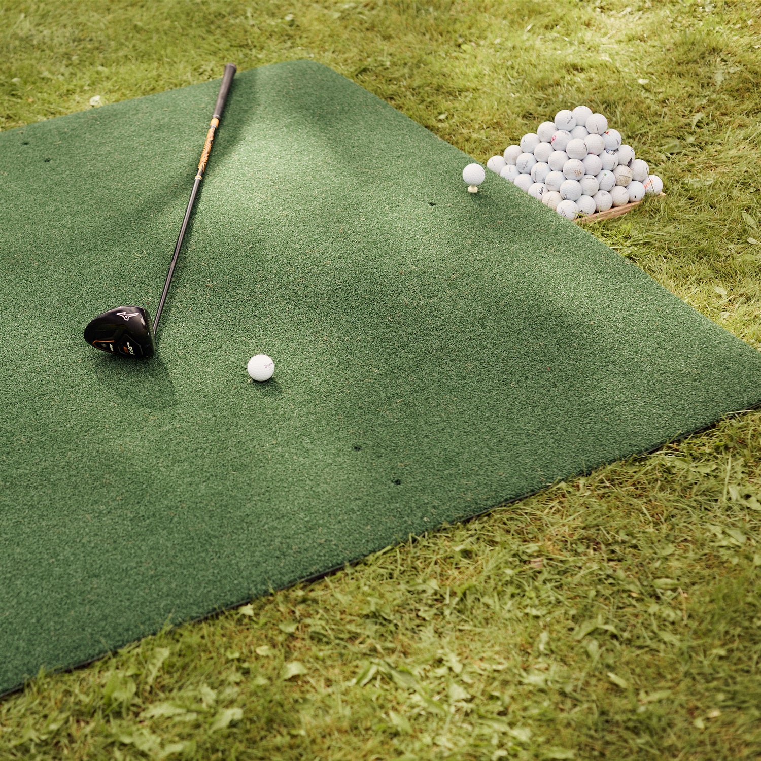 Golfmat: 100% hetzelfde als op de Driving-Range.